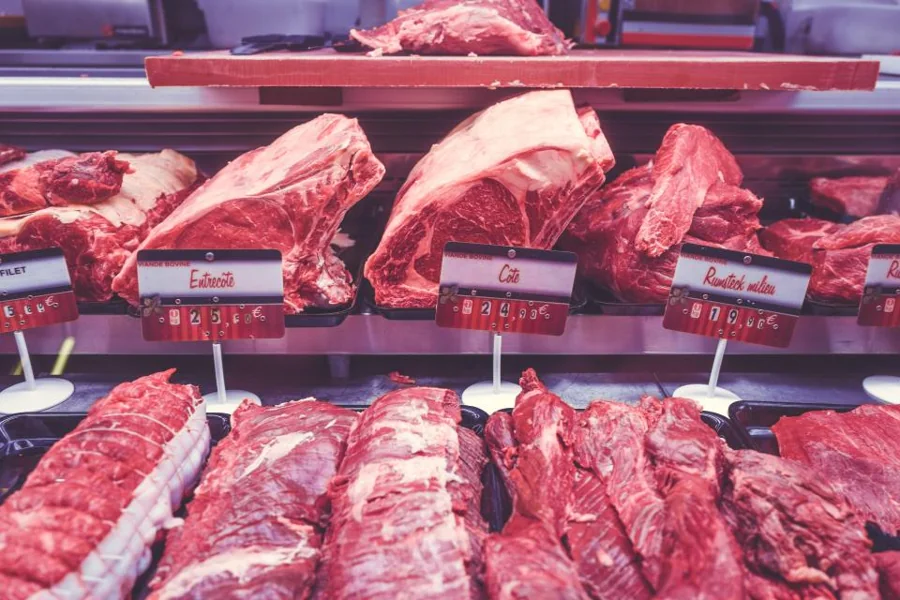 Butcher counter display with fresh cuts of beef